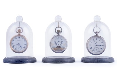 Lot 492 - Three pocket watches in glass display domes