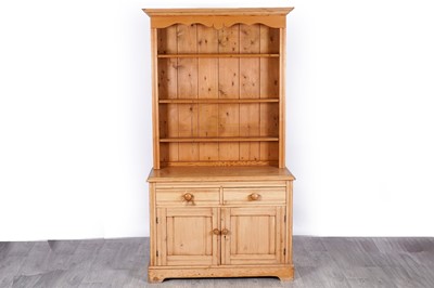 Lot 103 - An early 20th Century pine dresser