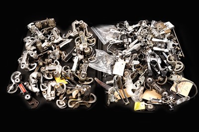 Lot 318 - A collection of bicycle derailleurs; and a selection of down-tube shifters
