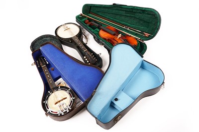 Lot 277 - Two mandolin banjos; and an Antoni violin
