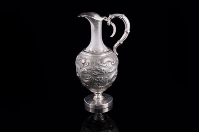 Lot 340 - A Chinese export silver oil ewer