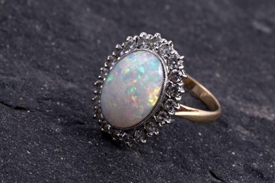 Lot 482 - An opal and diamond ring