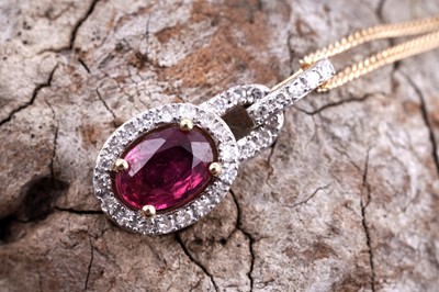 Lot 486 - A ruby and diamond pendant necklace