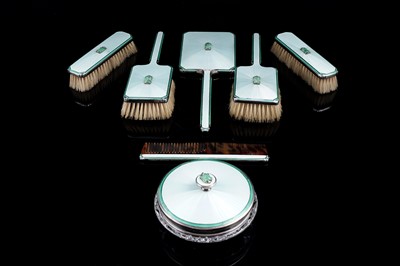 Lot 559 - A 1930s Art Deco guilloche-enamelled silver dressing table set