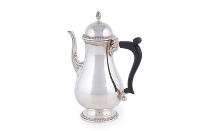 Lot 28 - An Elizabeth II silver coffee pot of baluster form