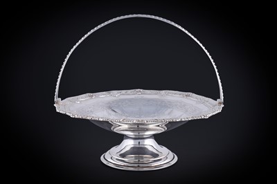 Lot 123 - A late Victorian silver swing handled basket