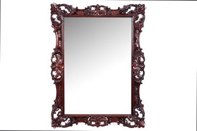 Lot 119 - A 19th Century-style carved mahogany framed wall mirror