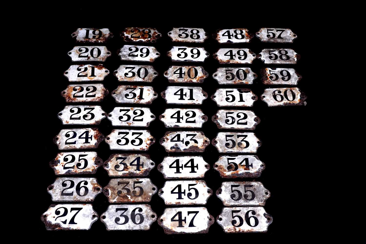 Lot 627 - A collection of enamelled bin labels