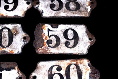 Lot 627 - A collection of enamelled bin labels
