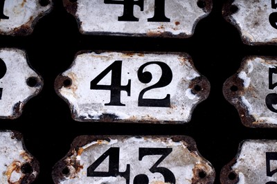 Lot 627 - A collection of enamelled bin labels