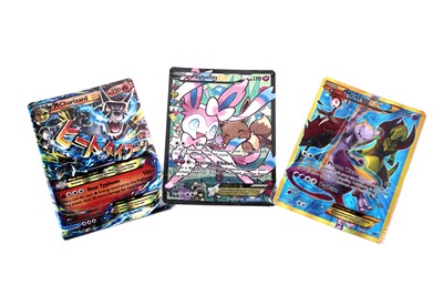 Lot 283 - Three Holographic Pokémon trading cards, 2015/16