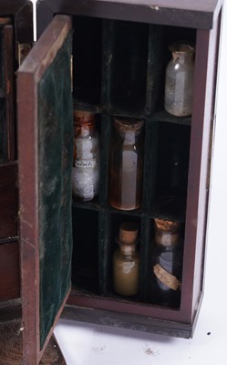 Lot 582 - A Georgian mahogany apothecary cabinet