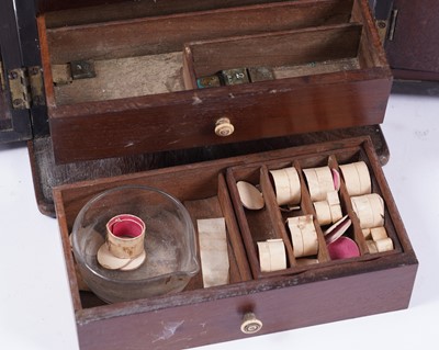 Lot 582 - A Georgian mahogany apothecary cabinet