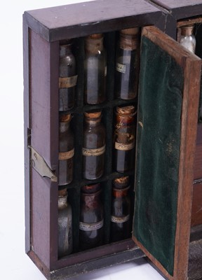 Lot 582 - A Georgian mahogany apothecary cabinet