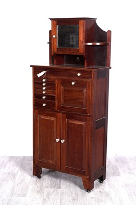 Lot 79 - A 20th Century mahogany dentist’s cabinet