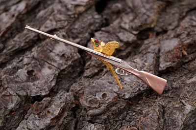 Lot 485A - Alabaster & Wilson: a 9ct gold Purdey shotgun and pheasant pattern brooch
