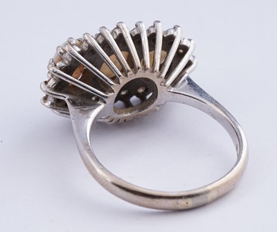 Lot 14 - An opal and diamond cluster ring