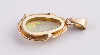 Lot 15 - An opal cabochon pendant