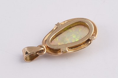 Lot 15 - An opal cabochon pendant