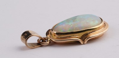 Lot 15 - An opal cabochon pendant