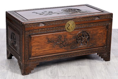 Lot 38 - An Oriental carved camphor wood blanket box