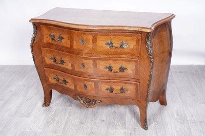 Lot 72 - A Louis XV-style tulipwood and walnut inlaid bombe commode