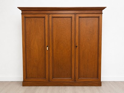 Lot 68 - A late 19th/early 20th Century mahogany triple wardrobe