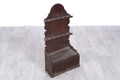 Lot 194 - An 18th Century stained-pine spoon rack