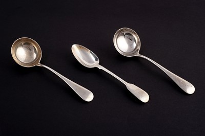 Lot 238 - A pair of Victorian sauce ladles; and a Georgian spoon, each with the same armorial crest