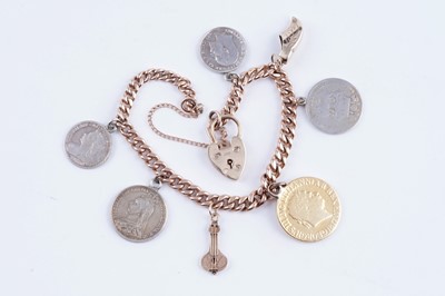 Lot 462 - A 9ct gold curb-link charm bracelet