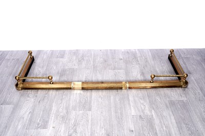 Lot 170 - A brass adjustable fender