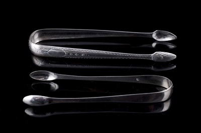 Lot 573 - Two pairs of Georgian silver sugar tongs