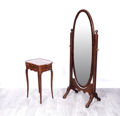 Lot 63 - A 20th Century mahogany cheval mirror; and an occasional table