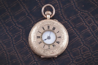 Lot 483 - An early 20th Century lady's 14ct gold cased half-hunter fob watch
