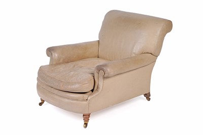 Lot 558 - Howard and Sons: a late Victorian beige leather upholstered armchair