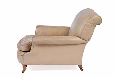 Lot 558 - Howard and Sons: a late Victorian beige leather upholstered armchair