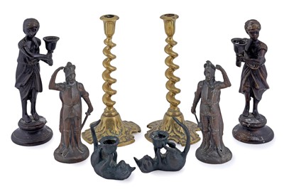 Lot 197 - A collection of bronze and brass candlesticks; an a pair of statuettes