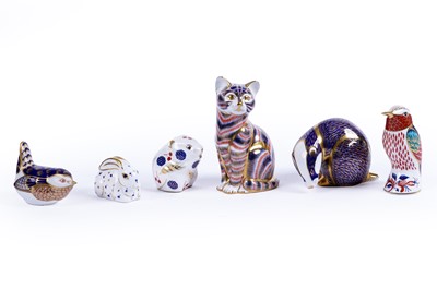 Lot 238 - A collection of six Royal Crown Derby paperweights