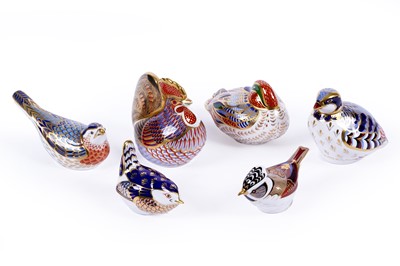Lot 239 - A collection of six Royal Crown Derby paperweights