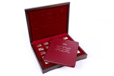 Lot 307 - An Elizabeth Our Queen silver ingot set
