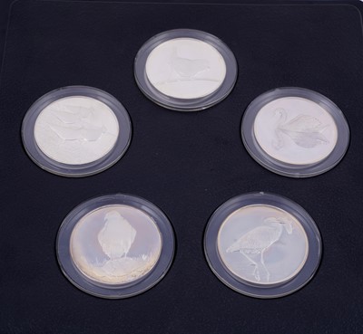 Lot 304 - Peter Scott's British Birds: A collection of thirty-five silver medals in a teak presentation box