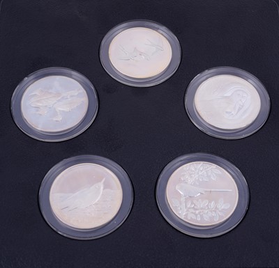 Lot 304 - Peter Scott's British Birds: A collection of thirty-five silver medals in a teak presentation box