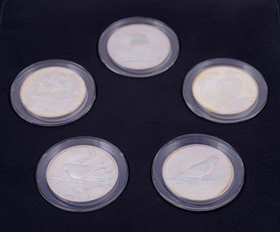 Lot 304 - Peter Scott's British Birds: A collection of thirty-five silver medals in a teak presentation box