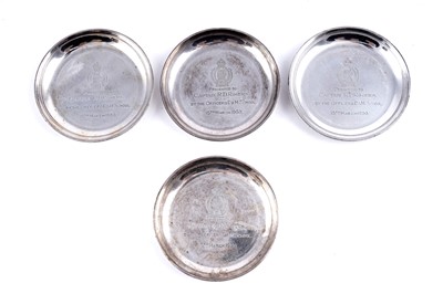 Lot 502 - A set of four Elizabeth II silver coasters