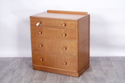 Lot 93 - A Meredew-style mid-20th Century oak veneered chest of drawers
