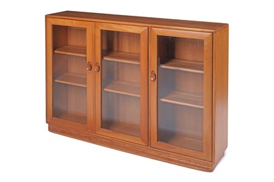 Lot 53 - Ercol: an elm Windsor model ‘811’ bookcase/display cabinet