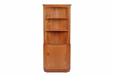 Lot 54 - Ercol: an elm Windsor model ‘743’ corner cupboard