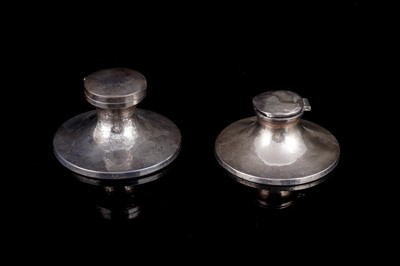 Lot 554 - Two early 20th Century silver capstan inkwells