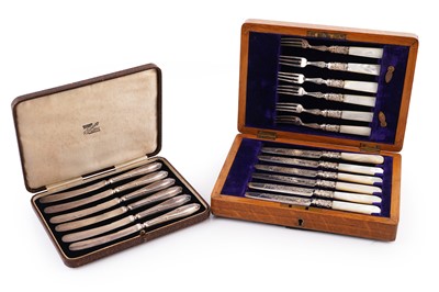 Lot 544 - A cased set of six George V silver-handled tea knives; and an Edwardian canteen