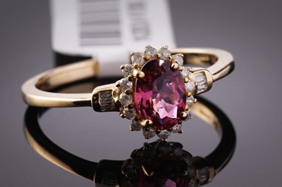 Lot 427 - A blush pink tourmaline and diamond ring